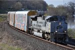 Vehicle train rolls east behind the Air Force unit